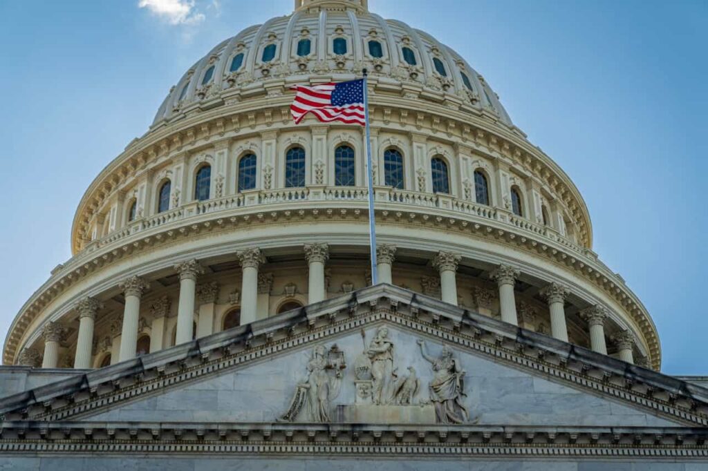 US Capitol building and American flag, Washington DC.