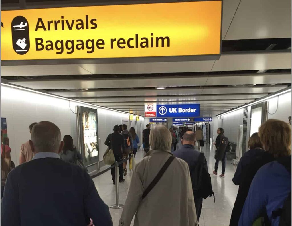 Arrivals hall at UK airport - impending immigration whitepaper will see further changes
