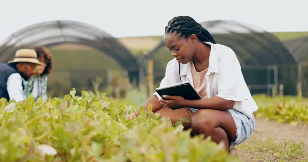 Agriculture researcher with notepad.