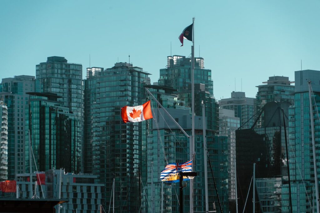 Vancouver skyline with Canadian flag, Canada.