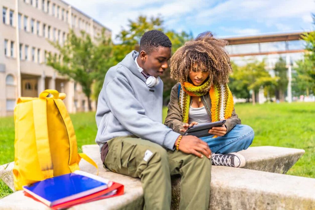 Students work together outside