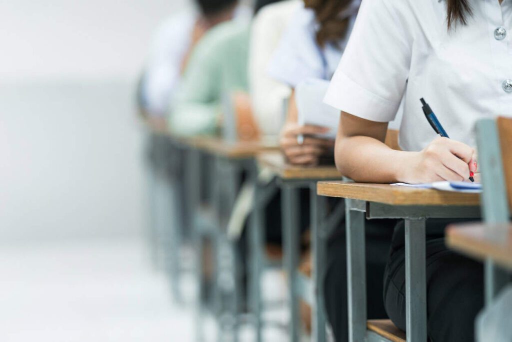 People sitting an exam.