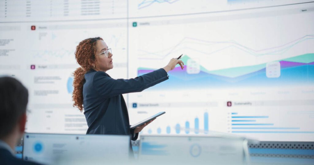 Woman giving data presentation.
