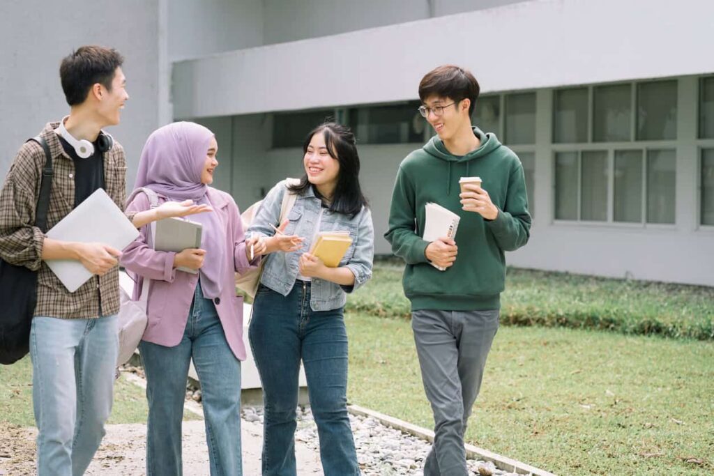 International students walking on university campus.